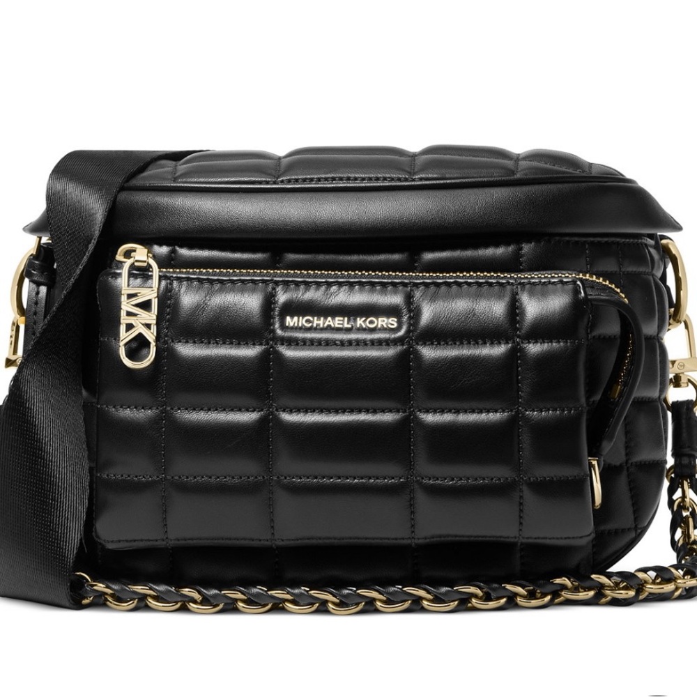 Brand new Michael Kors Sling Pack. Black & Gold